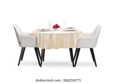 Round restaurant table with a cloth set for two persons isolated on white background - Shutterstock ID 2062226771
