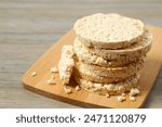 Round rice cakes on wooden background