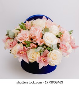 Round Royal Blue Velvet Box With White Roses And Pink Alstroemeria And Cymbidium.