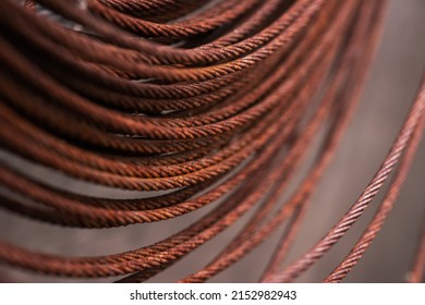 Round Rusty Steel Wire Coils. Metal Reels For Further Industrial Processing