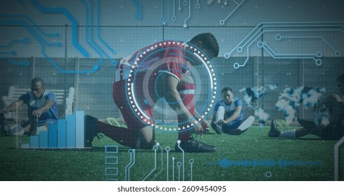 Round scanner and microprocessor connections against male soccer player tying his shoelaces. sports and technology concept