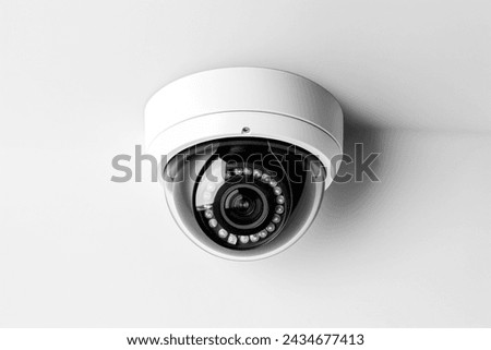 a round security digital camera isolated into white background.
