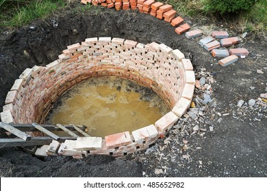 Round Septic Tank With Red Bricks