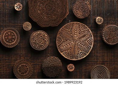 Round shape traditional Indian wood block pattern for textile printing on rustic wood background. Block Printing,Rajasthan India Block Printing,Wood block used for handmade textile printing,Hand craft - Shutterstock ID 1989923192