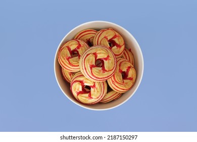 Round Shortbread Cookies With Raspberry Filling In A Plate On A Bed Blue Background, Top View. Close-up