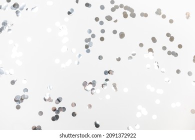 Round Silver Confetti On White Background Flat Lay Text Place - Image 