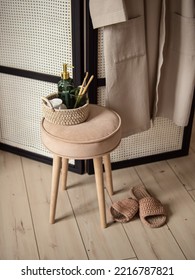 Round Soft Stool With Wooden Legs In Bathroom. Natural. Interior Of The Shower Room