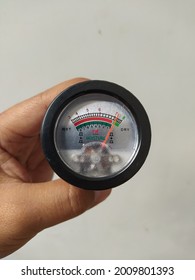 A Round Soil PH Meter Shows A Close-up View Of The Scale. High Tech Farming Concept.