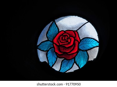 Round Stained Glass Window Of Red Rose