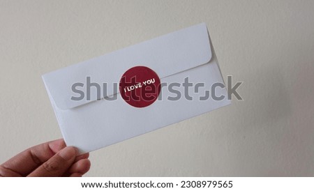 Round sticker mockup for gift, product label, circle gift tag, logo or thank you sticker mock up on white paper bubble envelope.