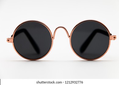 Round Sunglasses Close-up On A White Background