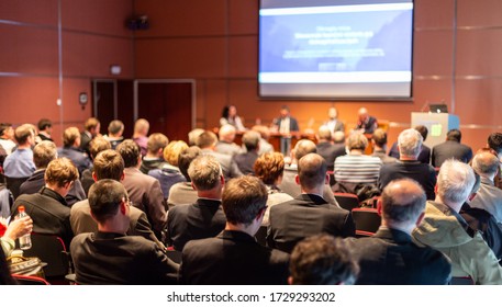 Round Table Discussion At Business Convention And Presentation. Audience At The Conference Hall. Business And Entrepreneurship Symposium.