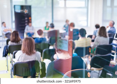 Round Table Discussion At Business Convention And Presentation. Audience At The Conference Hall.