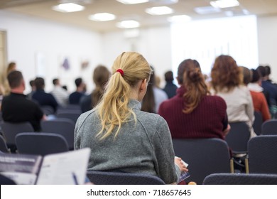 Round table discussion at business and entrepreneurship workshop. Audience at the conference hall. Presentation in lecture hall at university. Participants listening to lecture and making notes. - Shutterstock ID 718657645