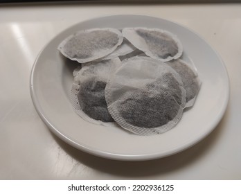 Round Tea Bag On White Plate