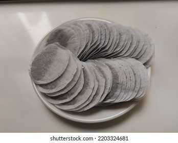 Round Tea Bag On White Plate