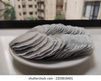 Round Tea Bag On White Plate