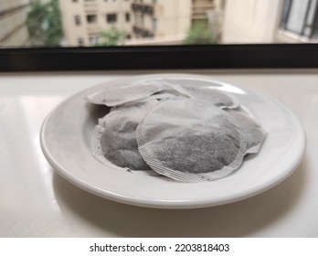 Round Tea Bag On White Plate