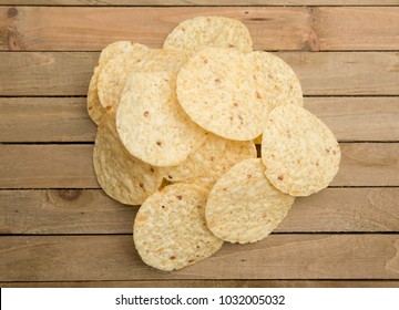 Round Tortilla Corn Chips On A Wooden Table 