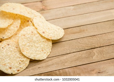 Round Tortilla Corn Chips On A Wooden Table 