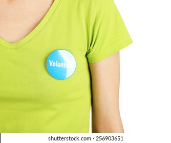 Round Volunteer Button On Shirt Of Girl Isolated On White