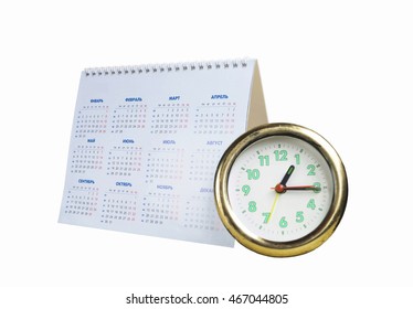 Round Watch With Desk Paper Calendar On White Background