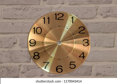 The Round Watch Face No Clock Hands On Grey Brick Pattern Background. Blank Clock Face Without Hour, Minute And Second Hands.