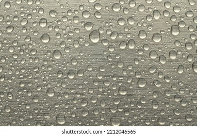 Round Water Drops On A Silver Background. Horizontal Background In Raindrops.