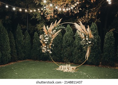 Round Wedding Arch With Pampass Grass And Eustoma Flowers