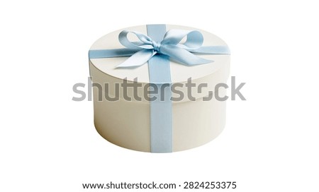 Round white gift box with light blue satin ribbon bow