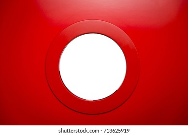 Round White Porthole In The Red Door.Copy Space.