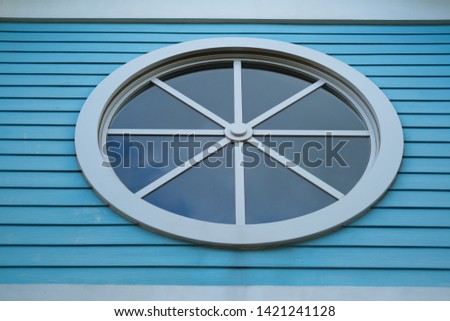 Round window and line pattern with cloud image