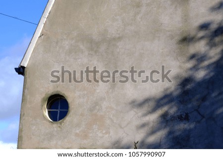 Similar – Weeds Growing in a Blocked Suburban House Rain Gutter