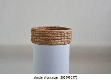 A Round Woven Basket To Store Various Things                 