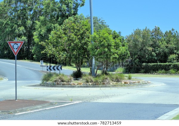 Roundabout in Australian city. Suburban\
street traffic\
roundabout.