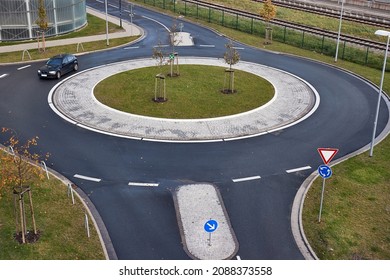 Roundabout on suburban road viewed from above