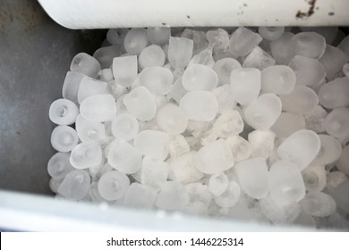 A Lot Of Rounded Ice Cubes Inside Of A Freezer Cooler Machine Of A Bar. Restaurant Appliance. Ice Cubes Ready For Preparation Of Drinks And Alcoholic Cocktails.