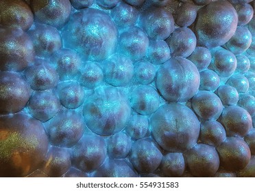 The rounded rock on undersea surface with fancy ocean blue lighting
