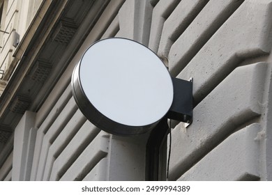 Rounded Street storefront shop, cafe, restaurant mounted signboard mock up design template. Blank white store sign design mockup.