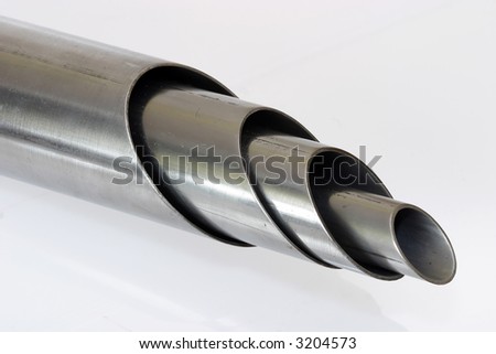 rounded welded steel pipes on white background