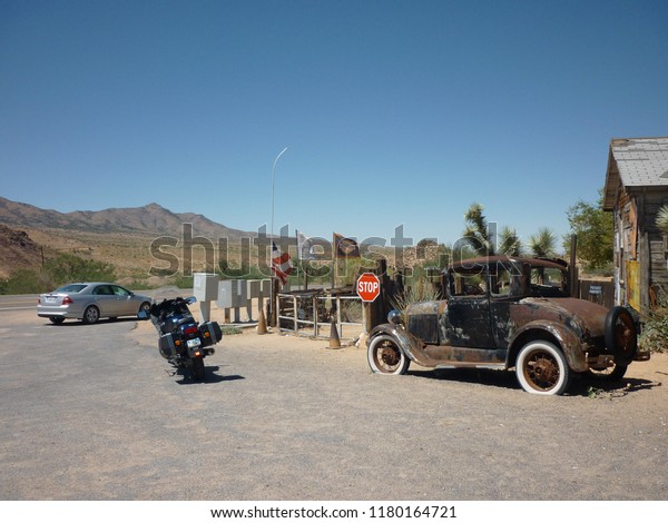 Route 66, Arizona, United States - August 29\
2010: Vehicles on the famous 66\
route