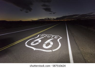 Route 66 Pavement Sign In The California Mojave Desert Night.