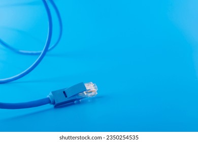 router cable, Patchcord, LAN cable for high speed internet, blue background