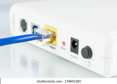 Router network hub with cable insert RJ45 port