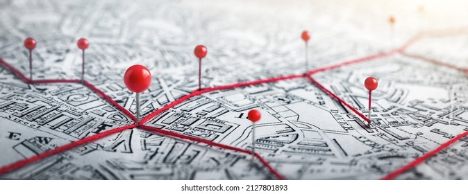 Routes with red pins on a city map. Concept on the  adventure, discovery, navigation, communication, logistics, geography, transport and travel topics. - Shutterstock ID 2127801893