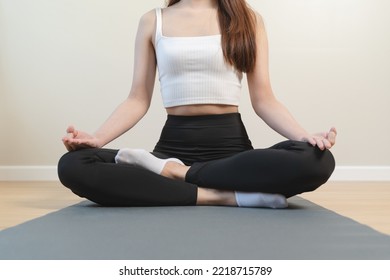 Routine Health Wellbeing Concept. Woman Doing Meditation At Home For Practice Her Mindfulness Pose Lotus Hand And Breathing Care.