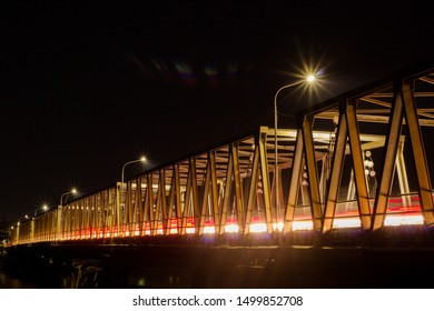 The Routine Of Leaving Work At Night On The Bridge