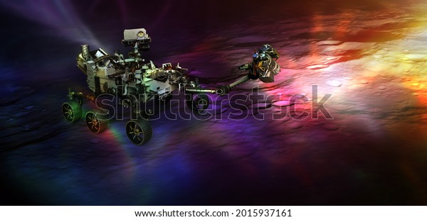 Rover on the dark side\
of Moon lighten by colorful light spots. Elements of this image\
furnished by NASA.
