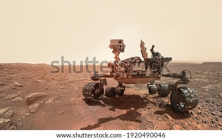 Rover on Mars surface. Exploration of red planet. Space station expedition. Perseverance. Expedition of Curiosity. Elements of this image furnished by NASA Foto d'archivio © 