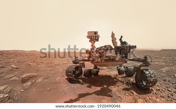 Rover on Mars surface.\
Exploration of red planet. Space station expedition. Perseverance.\
Expedition of Curiosity. Elements of this image furnished by\
NASA